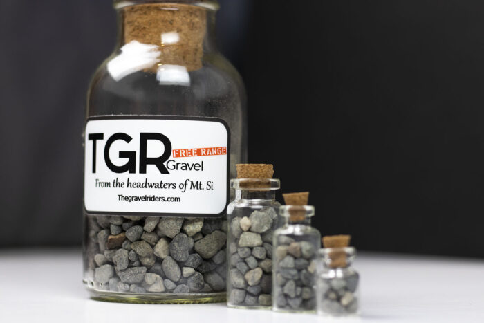 gravel samples in glass bottles