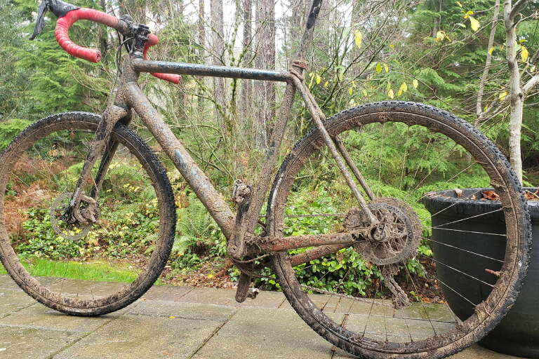 Mud-covered gravel bike after a wet Pacific Northwest ride
