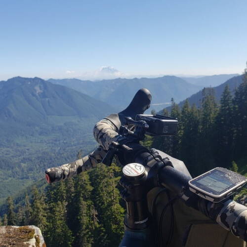 bike on mountaintop with garmin gps